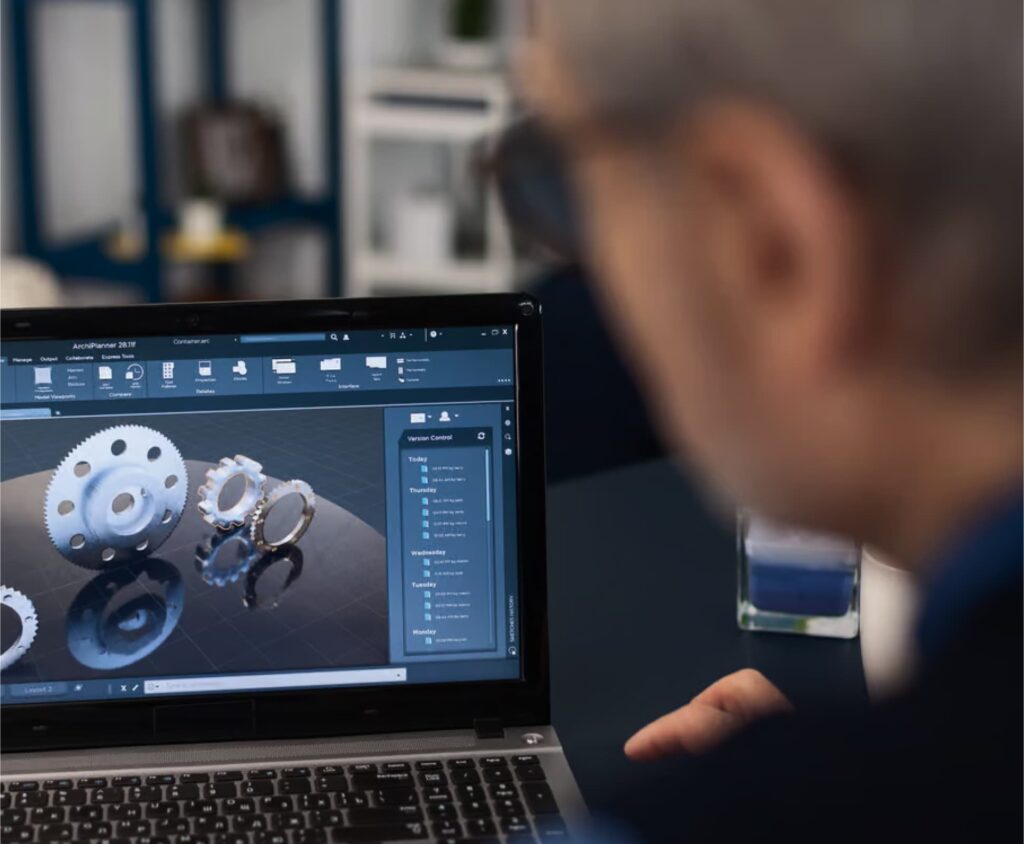 Image of a man working on his laptop